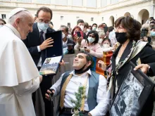 Pope Francis greets endurance athlete Michael Haddad at the general audience in the San Damaso Courtyard of the Apostolic Palace, June 2, 2021.